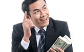Happy Person in a Suit Holding Money