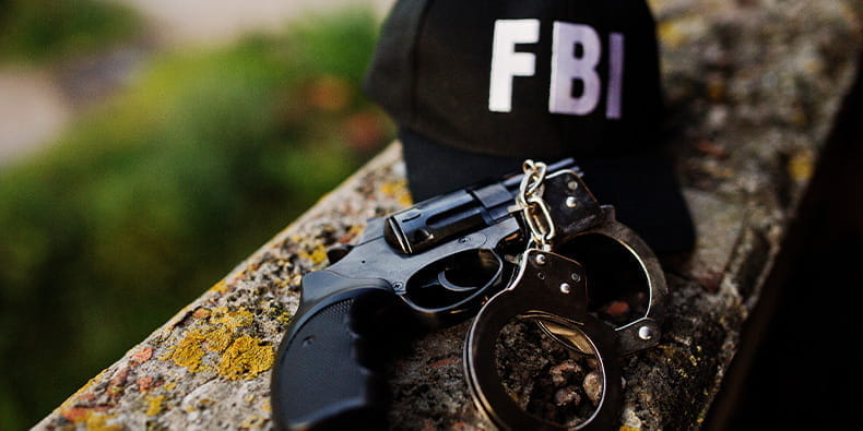 Basic FBI Equipment Laying on a Tree