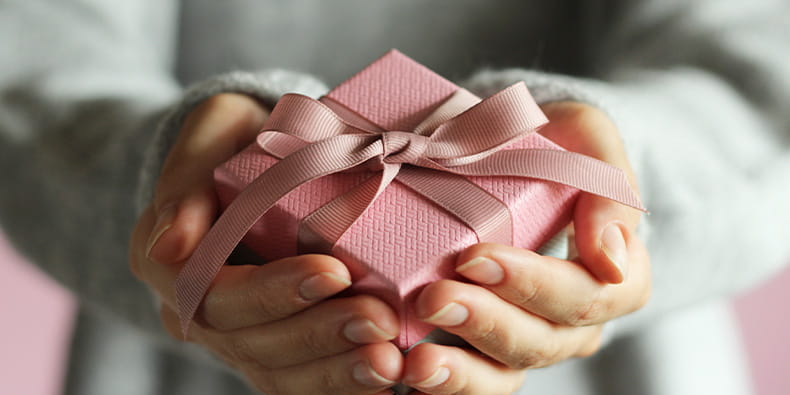 Woman Opening a Giftbox