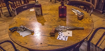 Poker Table and Revolvers 