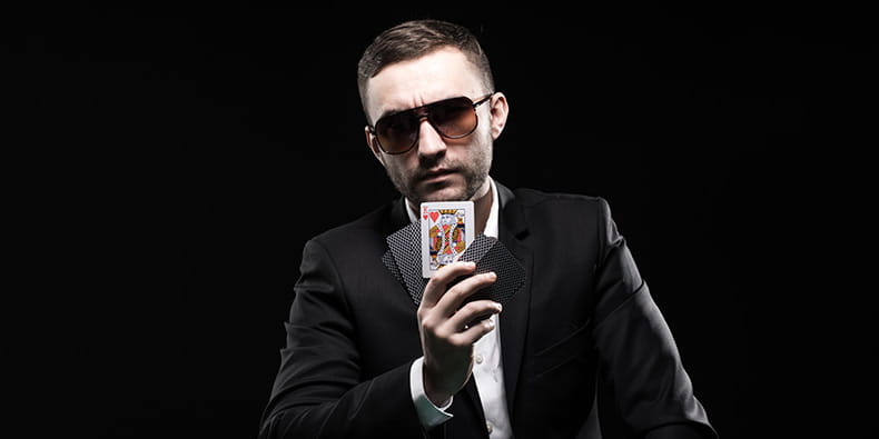 Man Playing Poker in a Casino