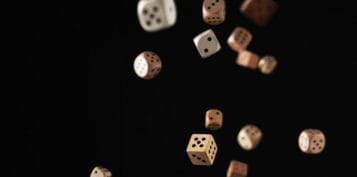 Wooden Dice Falling Down