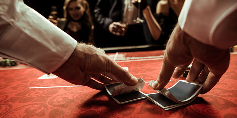 Professional Croupier Shuffling the Deck of Cards